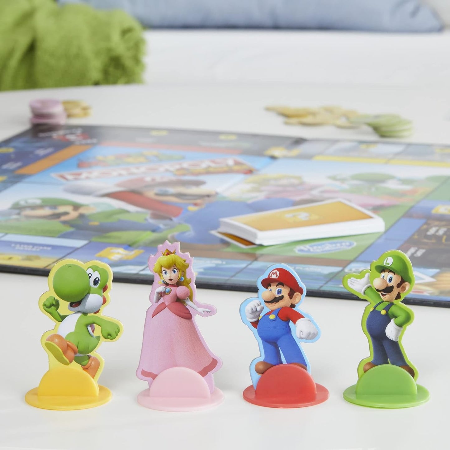 HotMonopoly Junior Super Mario Edition Board Game, Fun Kids' Ages 5 and Up, Explore The Mushroom Kingdom as Mario, Peach, Yoshi, or Luigi (Amazon Exclusive)