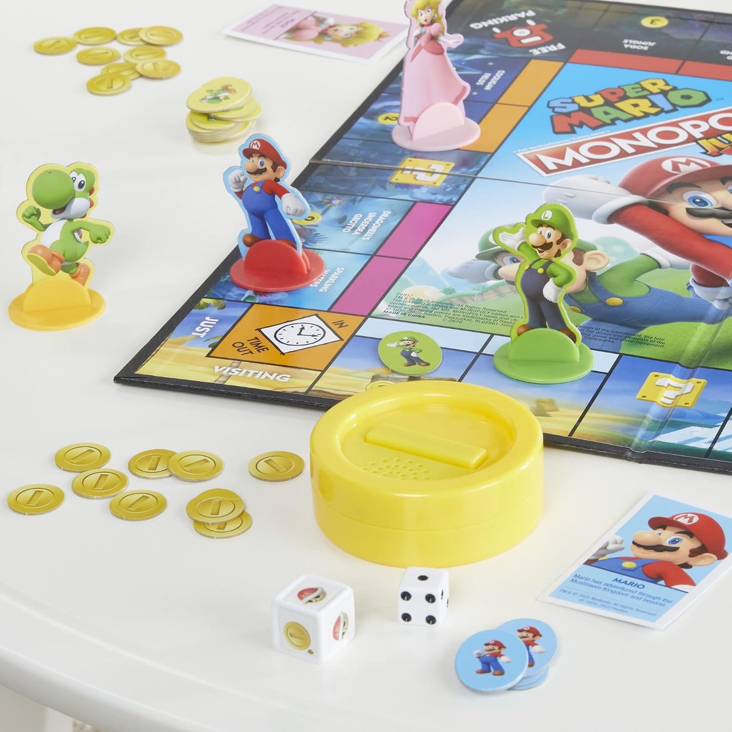 HotMonopoly Junior Super Mario Edition Board Game, Fun Kids' Ages 5 and Up, Explore The Mushroom Kingdom as Mario, Peach, Yoshi, or Luigi (Amazon Exclusive)
